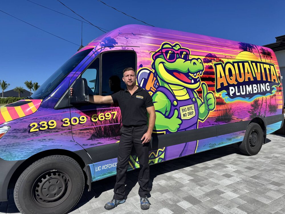 Oskar Huber with the Aqua Vita Plumbing van